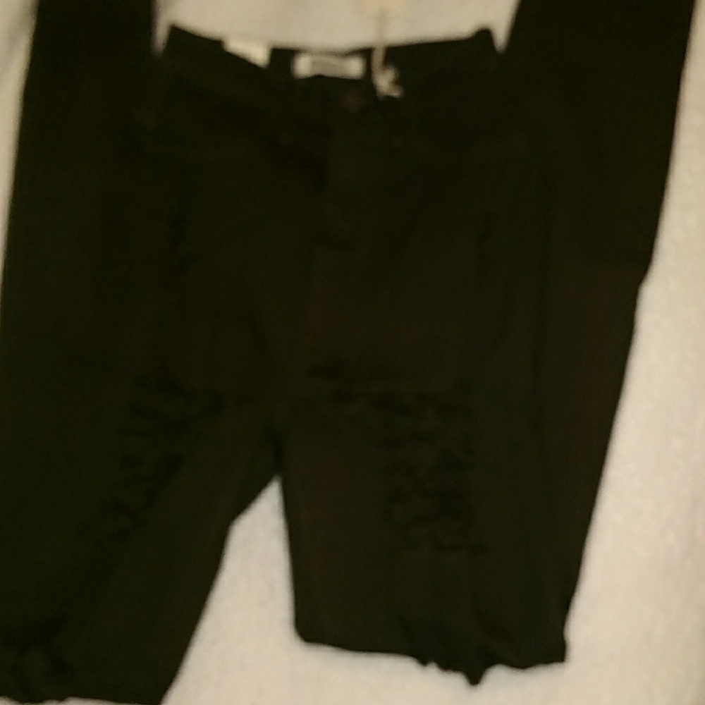 Olive green to gray, very distressed skinny jeans